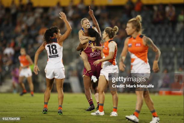 Sabrina Frederick-Traub of the Lions celebrates after kicking a goal during the round seven AFLW match between the Greater Western Sydney Giants and...