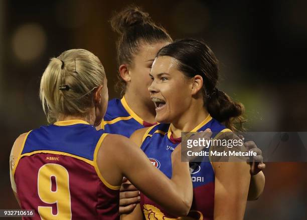 Sophie Conway of the Lions celebrates with team mates after kicking a goal during the round seven AFLW match between the Greater Western Sydney...