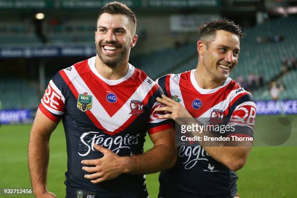 James Tedesco and Cooper Cronk of the Roosters celebrate at full time following the round two NRL match between the Sydney Roosters and the...