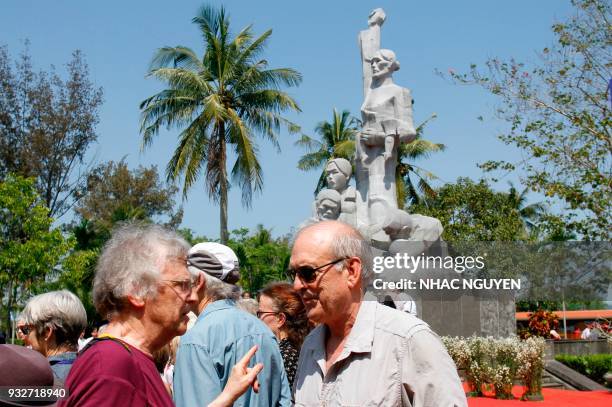 Former US Army photographer Ronald Haeberle visits the memorial grounds for victims of the My Lai massacre in the village of Son My in Quang Ngai...