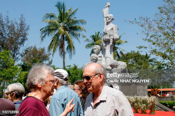 Former US Army photographer Ronald Haeberle visits the memorial grounds for victims of the My Lai massacre in the village of Son My in Quang Ngai...