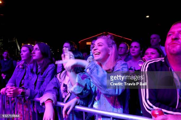 Festival goers watch Amy Shark perform onstage at Pandora during SXSW at Stubb's Bar-B-Q on March 15, 2018 in Austin, Texas.