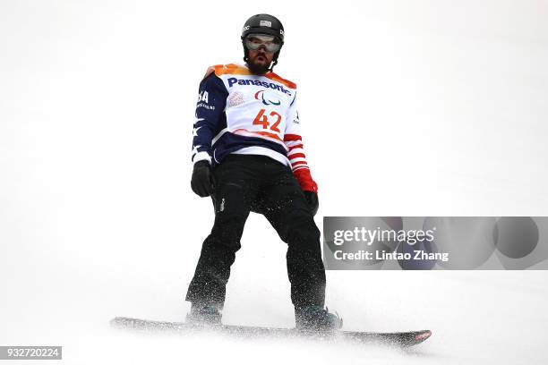 Keith Gabel of the United States reacts after competes in the Men's Banked Slalom SB-UL Run 3 during day seven of the PyeongChang 2018 Paralympic...