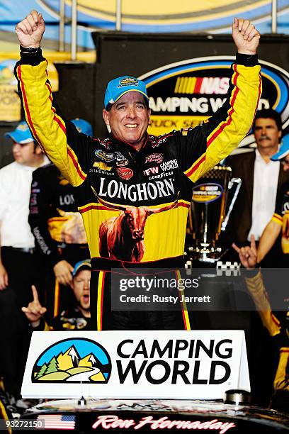 Ron Hornaday Jr. , driver of the Longhorn Chevrolet, celebrates winning the series title in Victory Lane after finishing 8th in the NASCAR Camping...