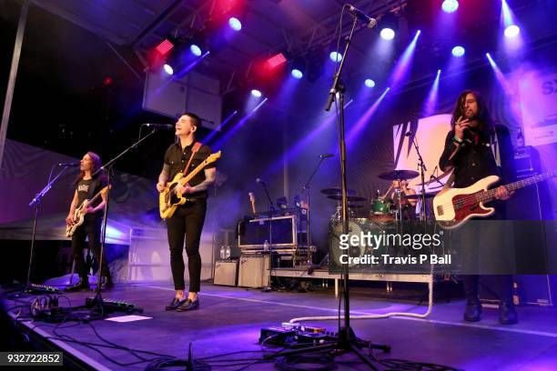 Armon Jay, Chris Carrabba, Mike Marsh, and Scott Schoenbeck of Dashboard Confessional perform onstage at Pandora during SXSW at Stubb's Bar-B-Q on...