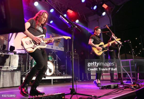 Armon Jay, Chris Carrabba, and Scott Schoenbeck of Dashboard Confessional perform onstage at Pandora during SXSW at Stubb's Bar-B-Q on March 15, 2018...