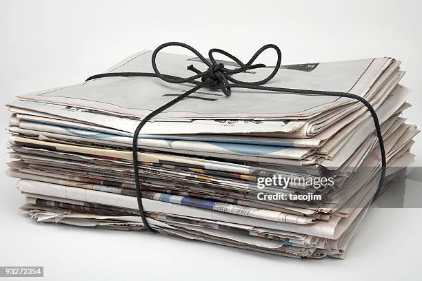 a picture of a bundle of newspapers - tangled stock pictures, royalty-free photos & images