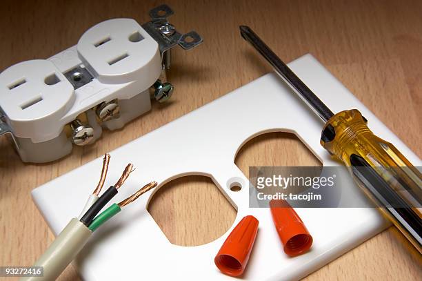 components needed to install an electrical socket yourself  - electricity stockfoto's en -beelden