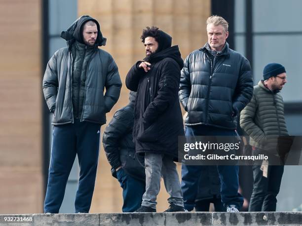 Actor Florian Munteanu, director Steven Caple Jr. And actor Dolph Lundgren are seen on set filming 'Creed II' at the Rocky Statue and the 'Rocky...