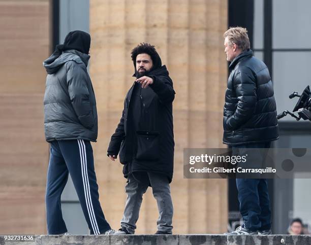 Actor Florian Munteanu, director Steven Caple Jr. And actor Dolph Lundgren are seen on set filming 'Creed II' at the Rocky Statue and the 'Rocky...