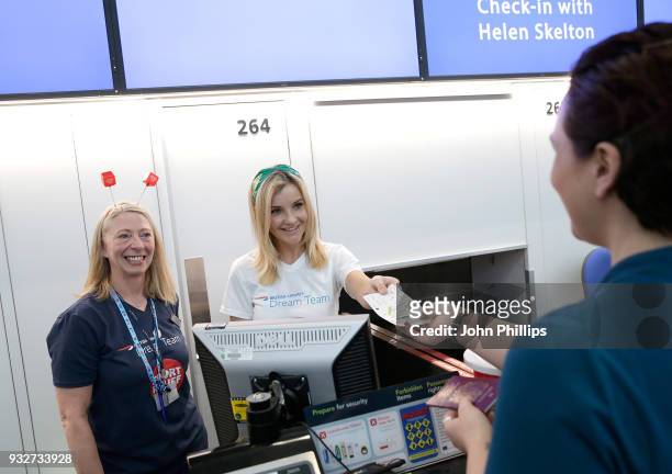 Helen Skelton helps British Airways customers at Gatwick Airport by checking in passengers to raise money for Sport Relief on March 16, 2018 in...