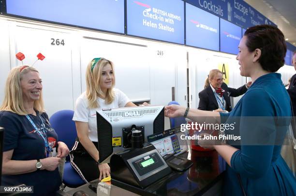 Helen Skelton helps British Airways customers at Gatwick Airport by checking in passengers to raise money for Sport Relief on March 16, 2018 in...