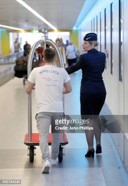 Max Whitlock helps British Airways customers at Gatwick Airport by becoming a baggage porter for the morning, to raise money for Sport Relief on...
