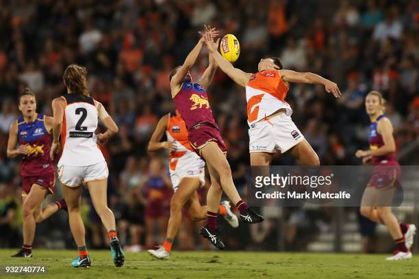 Courtney Gum of the Giants and Nat Exon of the Lions compete for a mark during the round seven AFLW match between the Greater Western Sydney Giants...