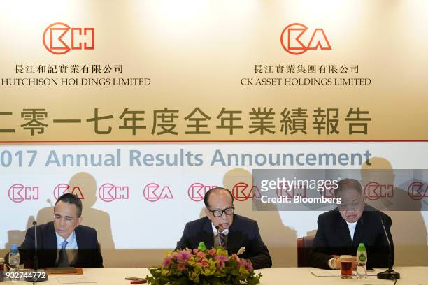 Li Ka-shing, chairman of CK Hutchison Holdings Ltd. And CK Asset Holdings Ltd., center, speaks as Victor Li, deputy chairman and co-managing director...