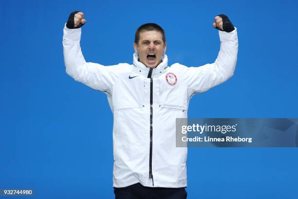 Silver medallist Evan Strong of USA celebrates during the medal ceremony for the Men's Snowboard Banked Slalom SB-LL2 Final on day seven of the...