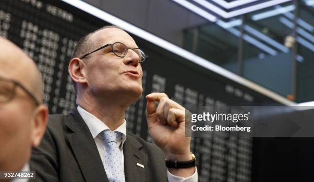 Bernd Montag, chief executive officer of Siemens Healthineers AG, speaks on the trading floor as Siemens AG make an initial public offering of shares...