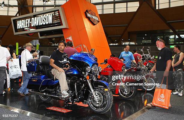 Man sits on a Harley Davidson during the Australian Motorcycle Expo at Sydney Olympic Park on November 21, 2009 in Sydney, Australia.