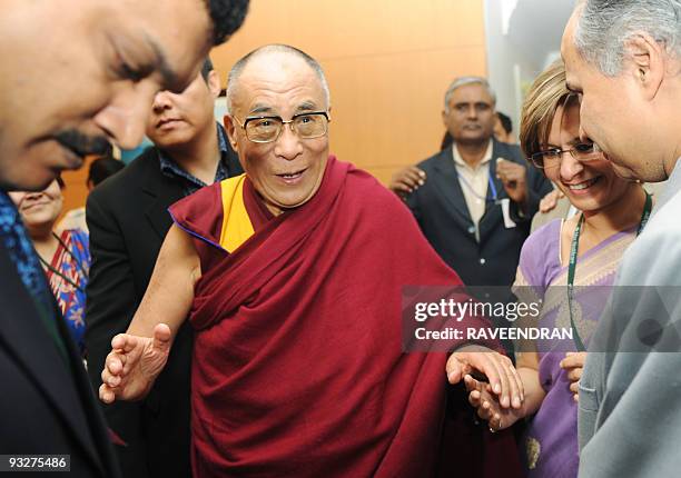 Tibetan exiled spiritual leader the Dalai Lama greets attendants at an inauguration ceremony of a new unit at Max Heart and Vascular Institute...