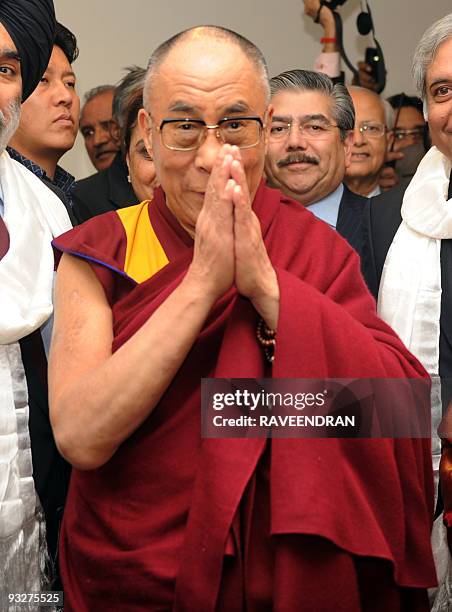 Tibetan exiled spiritual leader the Dalai Lama greets attendants at an inauguration ceremony of a new unit at Max Heart and Vascular Institute...