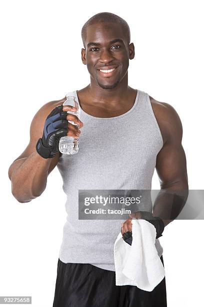 bodybuilder with bottled water - adult male vest exercise stock pictures, royalty-free photos & images