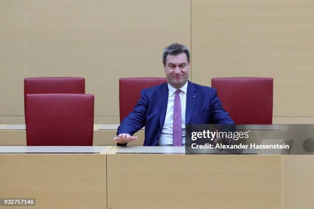 Markus Soeder of the Bavarian Christian Democrats receives applause from colleagues following his election to governor of Bavaria at the Bavarian...