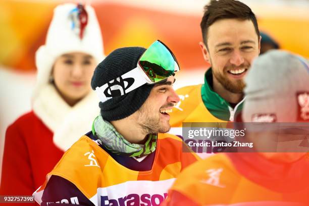 Gold medalist Mike Minor of the United States celebrates during the victory ceremony following the the Men's snowboard Slalom SB-UL during day seven...