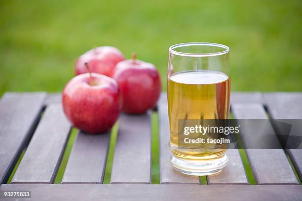 apples and juice - apple juice stock pictures, royalty-free photos & images