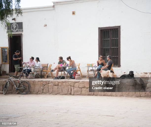 cafe in old town of san pedro, dogs - san pedro stock pictures, royalty-free photos & images