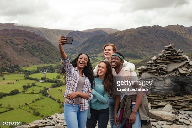 a selfie at the top of the mountain - borrowdale imagens e fotografias de stock