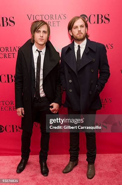 Jared Followill and Caleb Followill of Kings of Leon attend the Victoria's Secret fashion show at The Armory on November 19, 2009 in New York City.