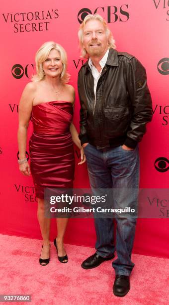 Victoria's Secret CEO Sharen Turney and Sir Richard Branson attend the Victoria's Secret fashion show at The Armory on November 19, 2009 in New York...