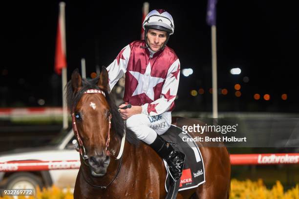 Jamie Mott returns to the mounting yard aboard Cliff's Edge after winning the Hacer Group Alister Clark Stakes at Moonee Valley Racecourse on March...