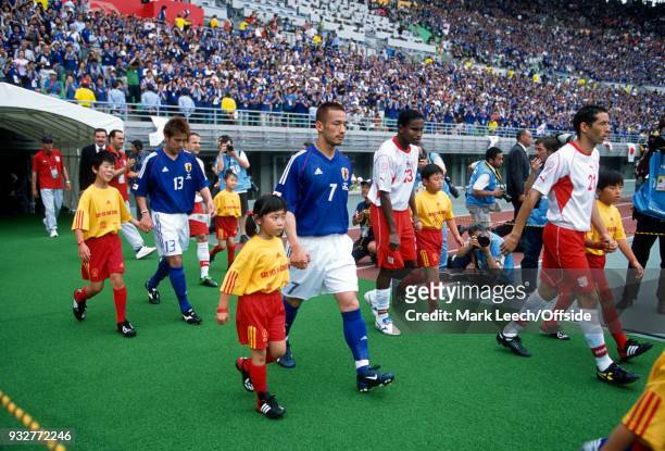 June 2002 - 2002 World Cup Football - Tunisia v Japan - Atsushi Yanagisawa of Japan, Hidetoshi Nakata of Japan, Jose Clayton of Tunisia and Mourad...