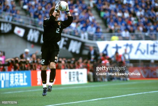June 2002 - 2002 World Cup Football - Tunisia v Japan - Japan goalkeeper Seigo Narazaki jumps up to catch the ball