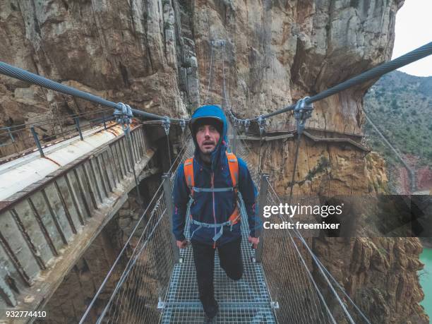 man in caminito del ray - caminito del rey málaga province stock pictures, royalty-free photos & images