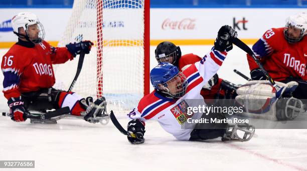 Zdenek Krupicka of Czech Republic celebrates after he scores a goal in the Ice Hockey classification game between Norway and Czech Republic during...