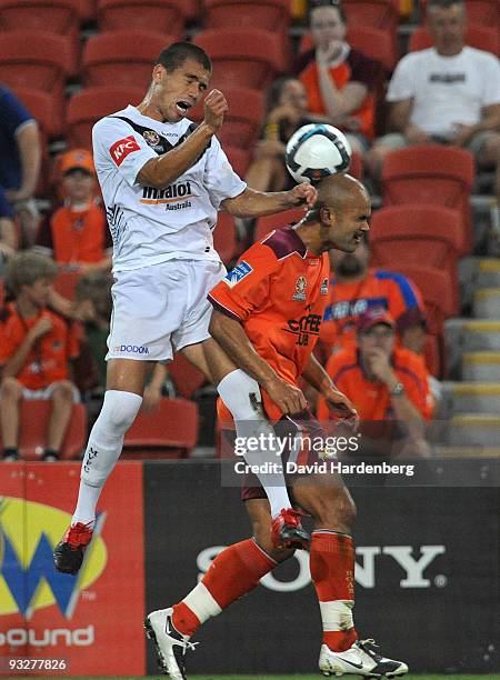 Sergio Van Dijk of the Roar and Rodrigo Vargas of the Victory compete for the ball during the round 15 A-League match between the Brisbane Roar and...