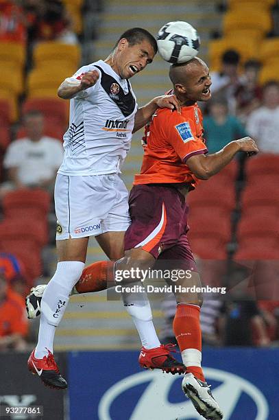 Sergio Van Dijk of the Roar and Rodrigo Vargas of the Victory compete for the ball during the round 15 A-League match between the Brisbane Roar and...