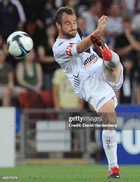 Grant Brebner of the Victory kicks the ball during the round 15 A-League match between the Brisbane Roar and the Melbourne Victory at Suncorp Stadium...