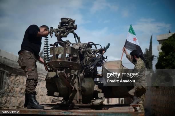 Members of Free Syrian Army , backed by Turkish Armed Forces, prepare guns for firing to hit YPG/PKK-Daesh terrorists positions within the "Operation...