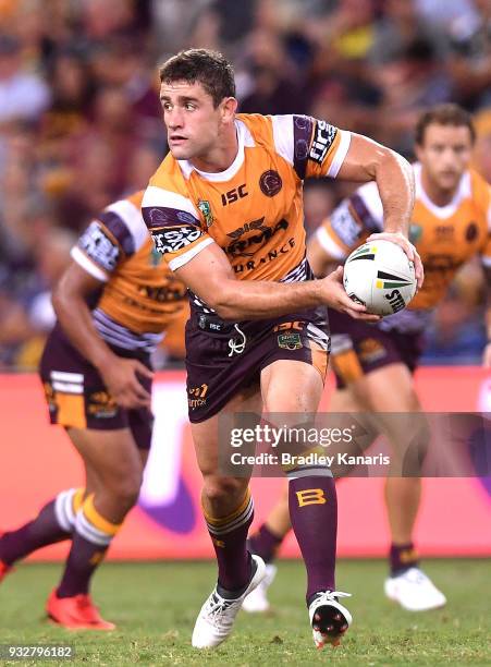 Andrew McCullough of the Broncos runs with the ball during the round two NRL match between the Brisbane Broncos and the North Queensland Cowboys at...