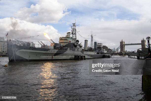 One of the six inch guns on HMS Belfast is fired during a six-gun salute to mark its 80th anniversary, on March 16, 2018 in London, England. The...