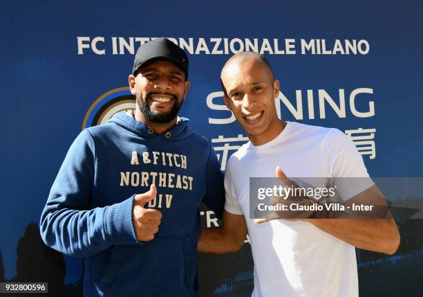 Joao Miranda de Souza Filho and Maicon pose for a photo during the FC Internazionale training session at the club's training ground Suning Training...