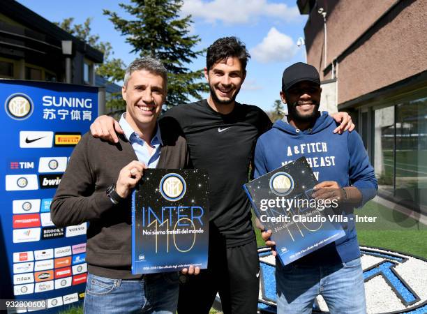 Hernan Crespo, Andrea Ranocchia and Maicon pose for a photo during the FC Internazionale training session at the club's training ground Suning...