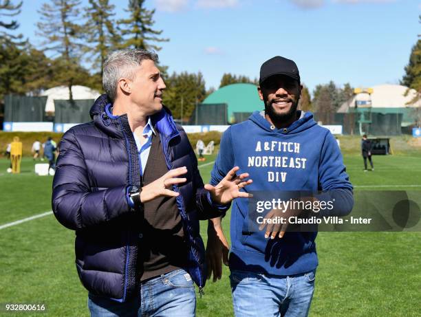 Hernan Crespo and Maicon chat during the FC Internazionale training session at the club's training ground Suning Training Center in memory of Angelo...