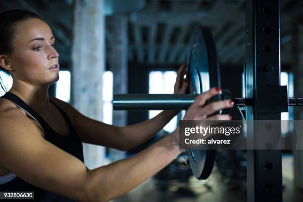 Female Racking Weights 285 Barbell Weight Plate Stock Photos, High-Res Pictures, and Images ...