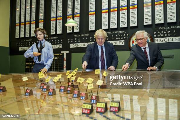British Foreign Secretary Boris Johnson and his Polish counterpart Jacek Czaputowicz visit a Battle of Britain bunker in Uxbridge on March 16 in...