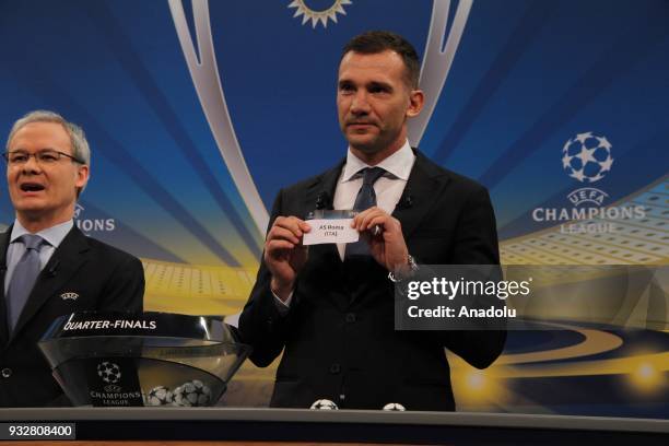 Ukrainian former football player Andriy Shevchenko shows the slip of AS Roma during the draw for the quarter finals round of the UEFA Champions...