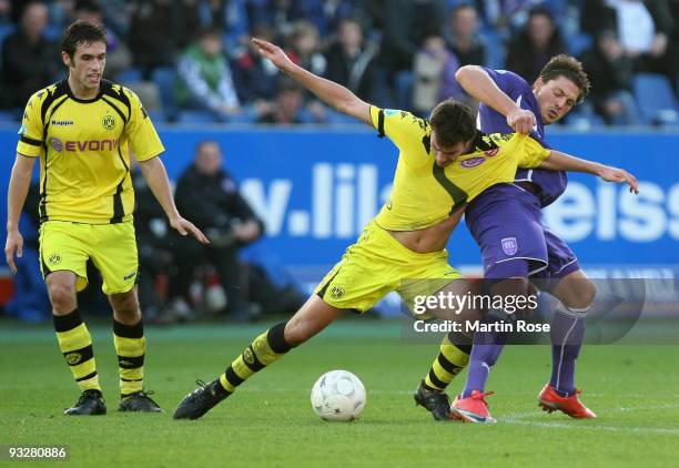 Bjoern Lindemann of Osnabruck and Marcel Grosskreutz of Dortmund II battle for the ball during the third Bundesliga match between VfL Osnabrueck and...